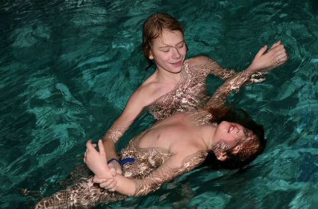 Adults and teens nudists in the pool photo Purenudism [Naturism Archiv]