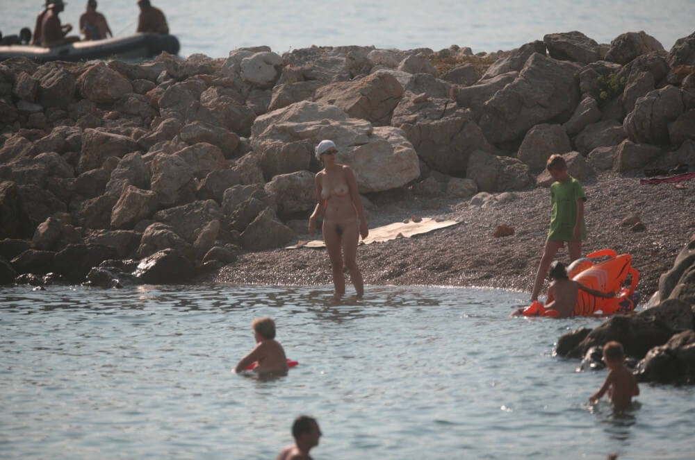 FKK cove pyramid in waters - Naturism promotes tolerance