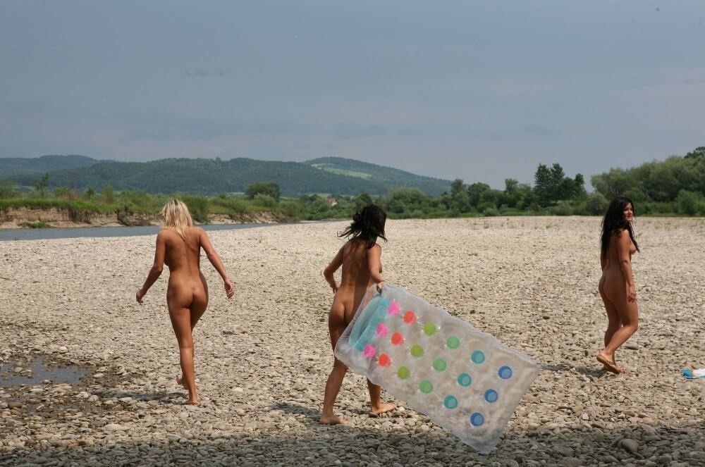 Naturist Park Floating On River photos - Naturism and nudism as a philosophy of respect for oneself and the world around us