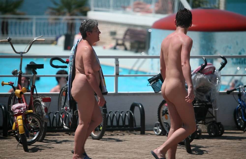 Sun-Soaked Sidewalk pics - The first step toward home nudism