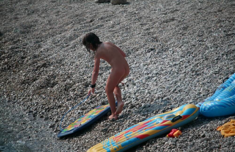 Naturist Surf Board Glides pics - Growing up on a nudist beach