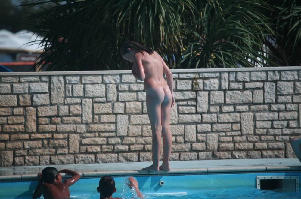 Naturist Pool-Side Singles pics - Rejecting Swimsuits