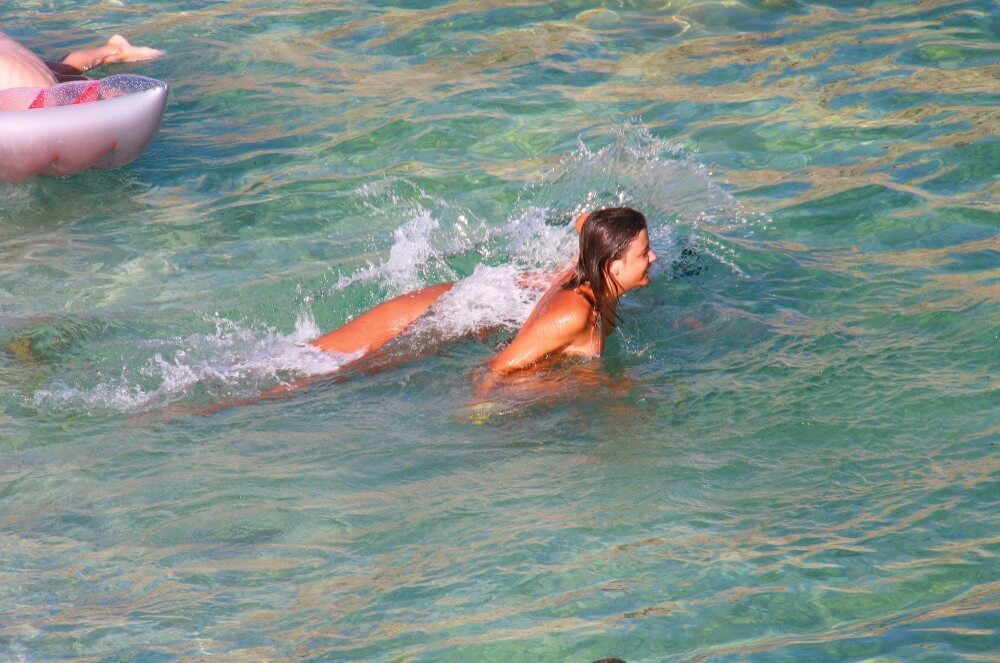 Ula FKK Teen Shore Run pics - A defining feature of naturism is the absence of clothing